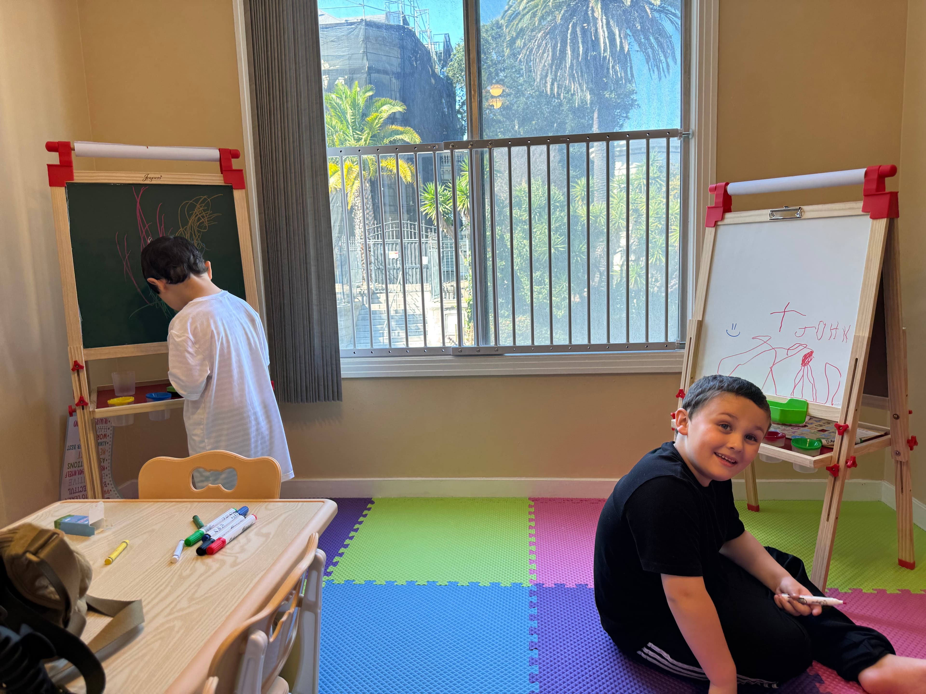 Art activity time with easels and drawing